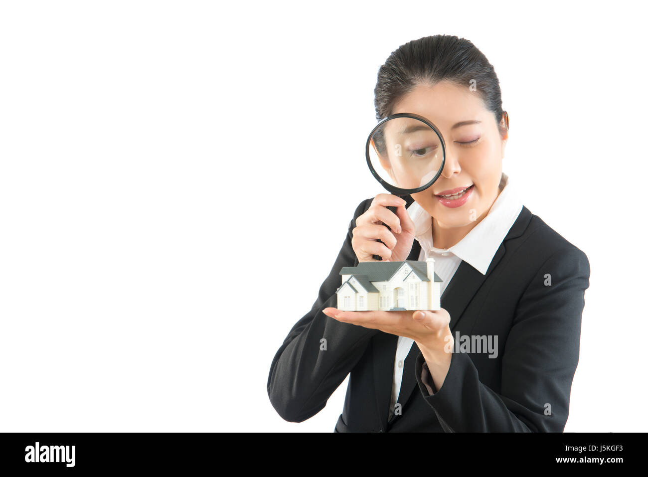 home cleaning company care family every day. professional manager help looking for new house. asian businesswoman used magnifier. Stock Photo