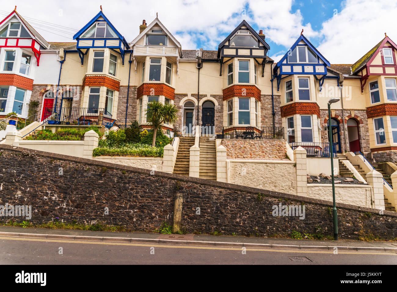 Typical English architecture, residential buildings in a row along the ...