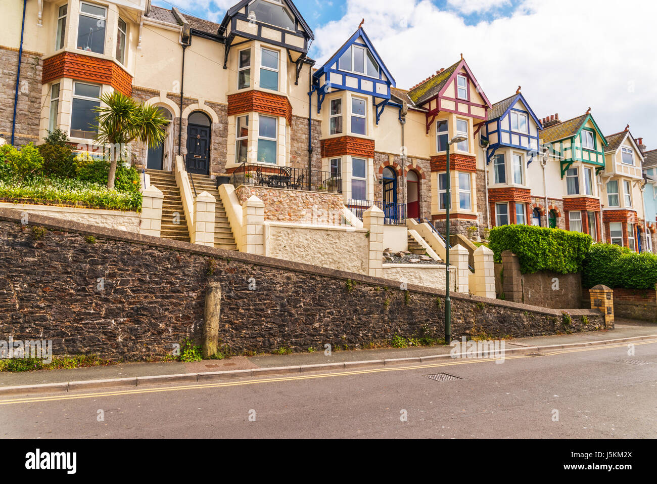 Typical English architecture, residential buildings in a row along the ...