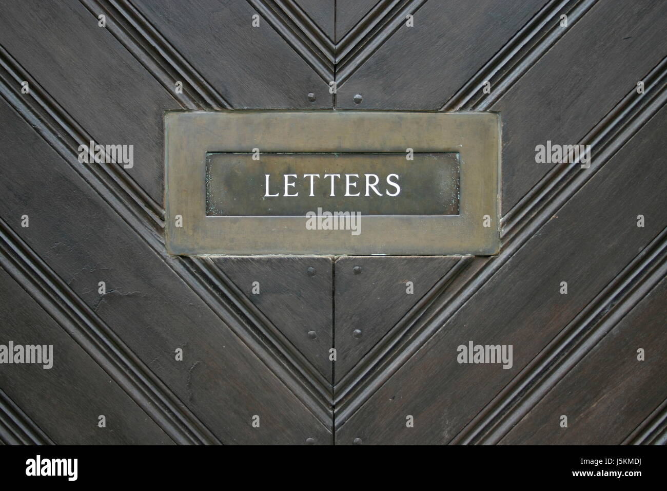 entrance door mailbox mail slot mailboxes sender post letters letters tre Stock Photo