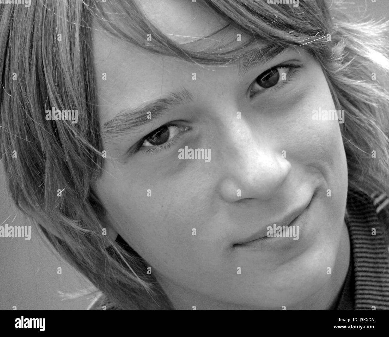 teen male masculine face portrait eye organ bw hairdo teenager puberty Stock Photo