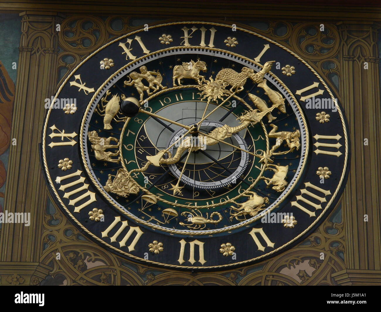 lion cat big cat feline predator moon clock time sagittarius astrology ram Stock Photo