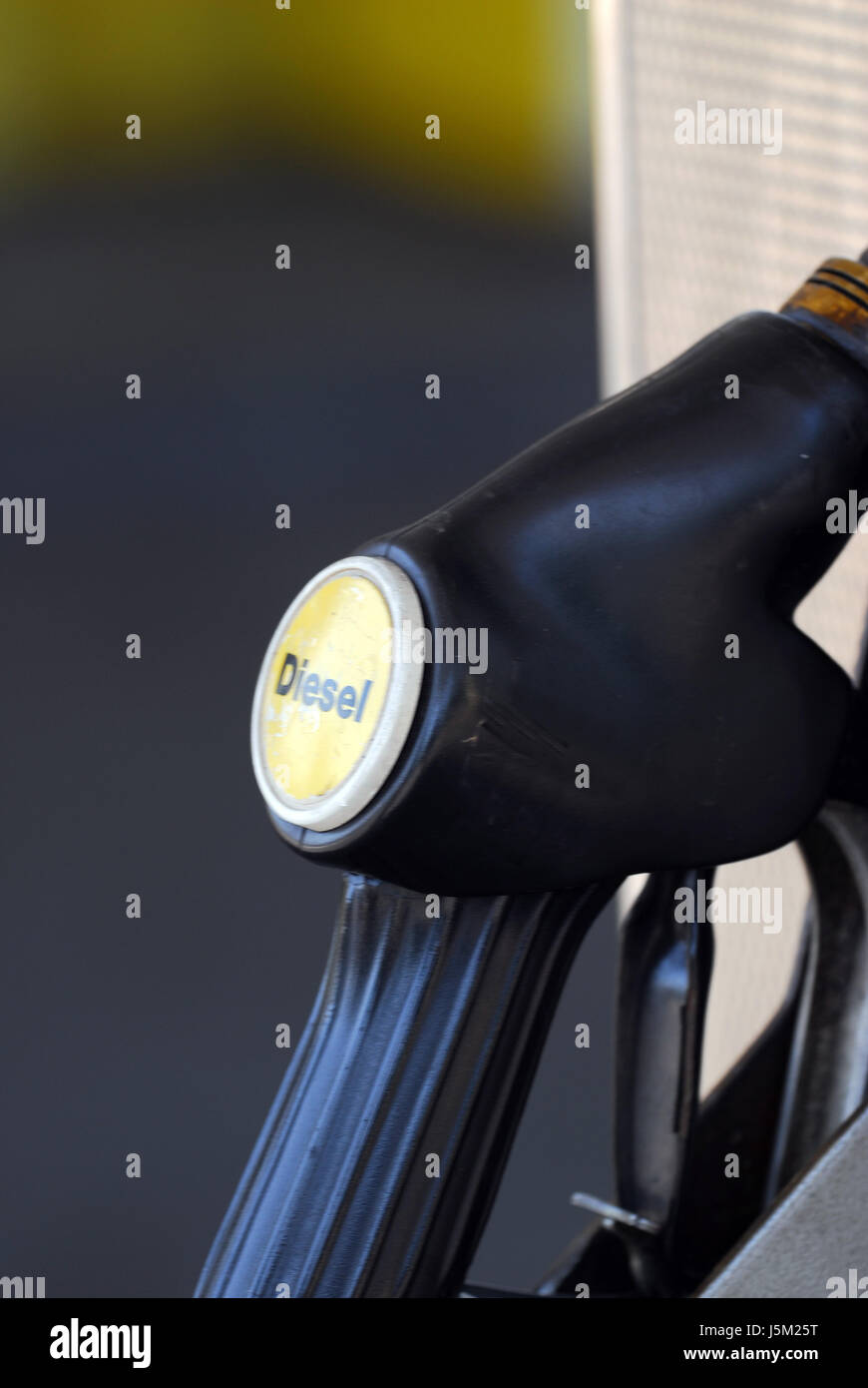 raw material diesel tap petrol to fuel fuel markup price increase multinational Stock Photo