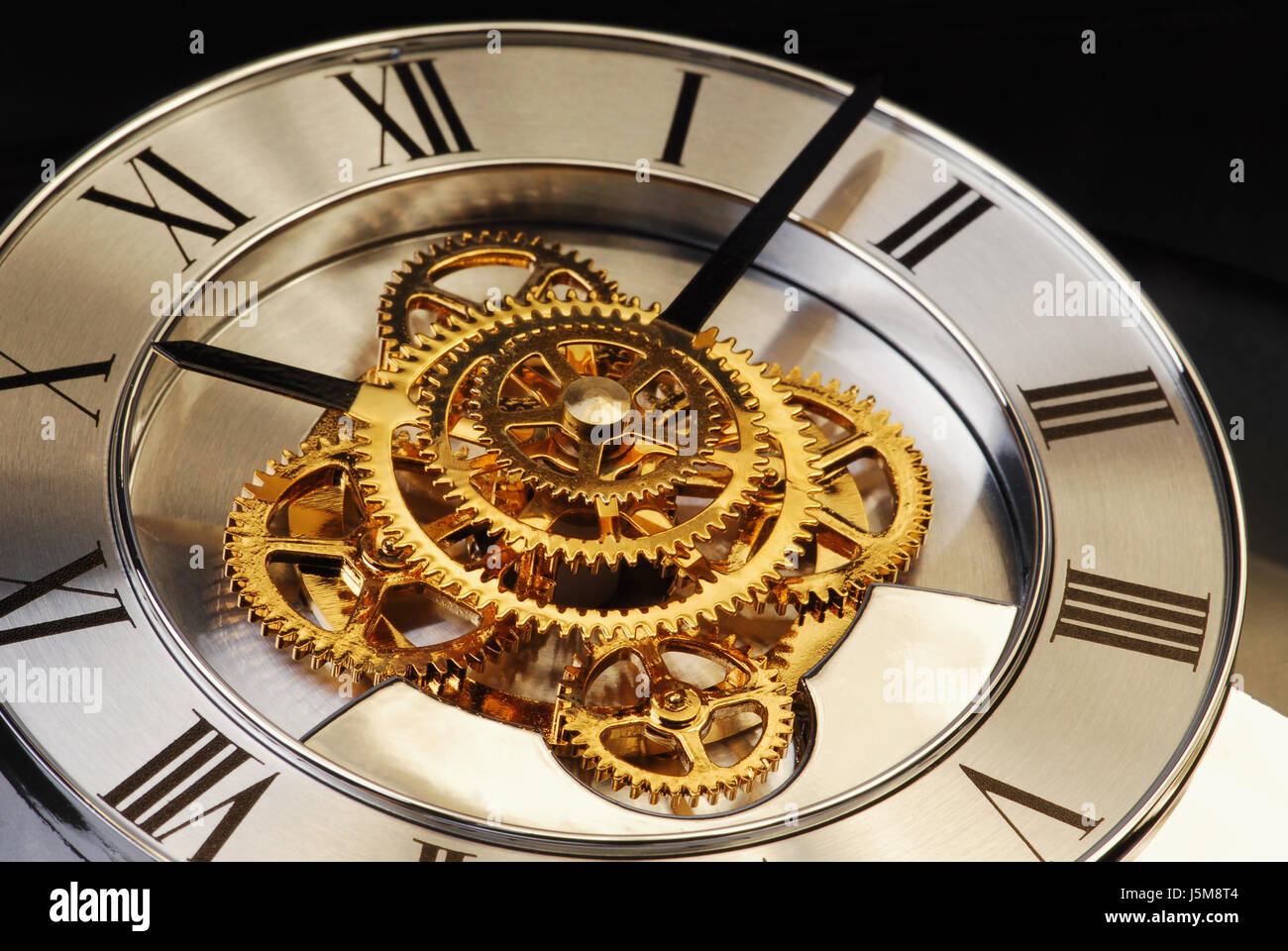 future clock pointer time metal wheel cogwheel gear wheels past bright ...
