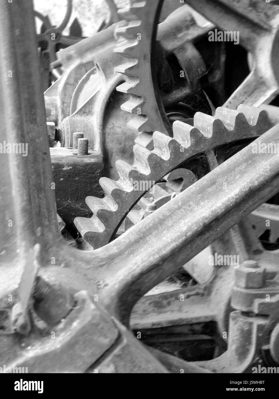 engine drive motor bw gear wheel cogwheel gear wheels mechanics transmission Stock Photo