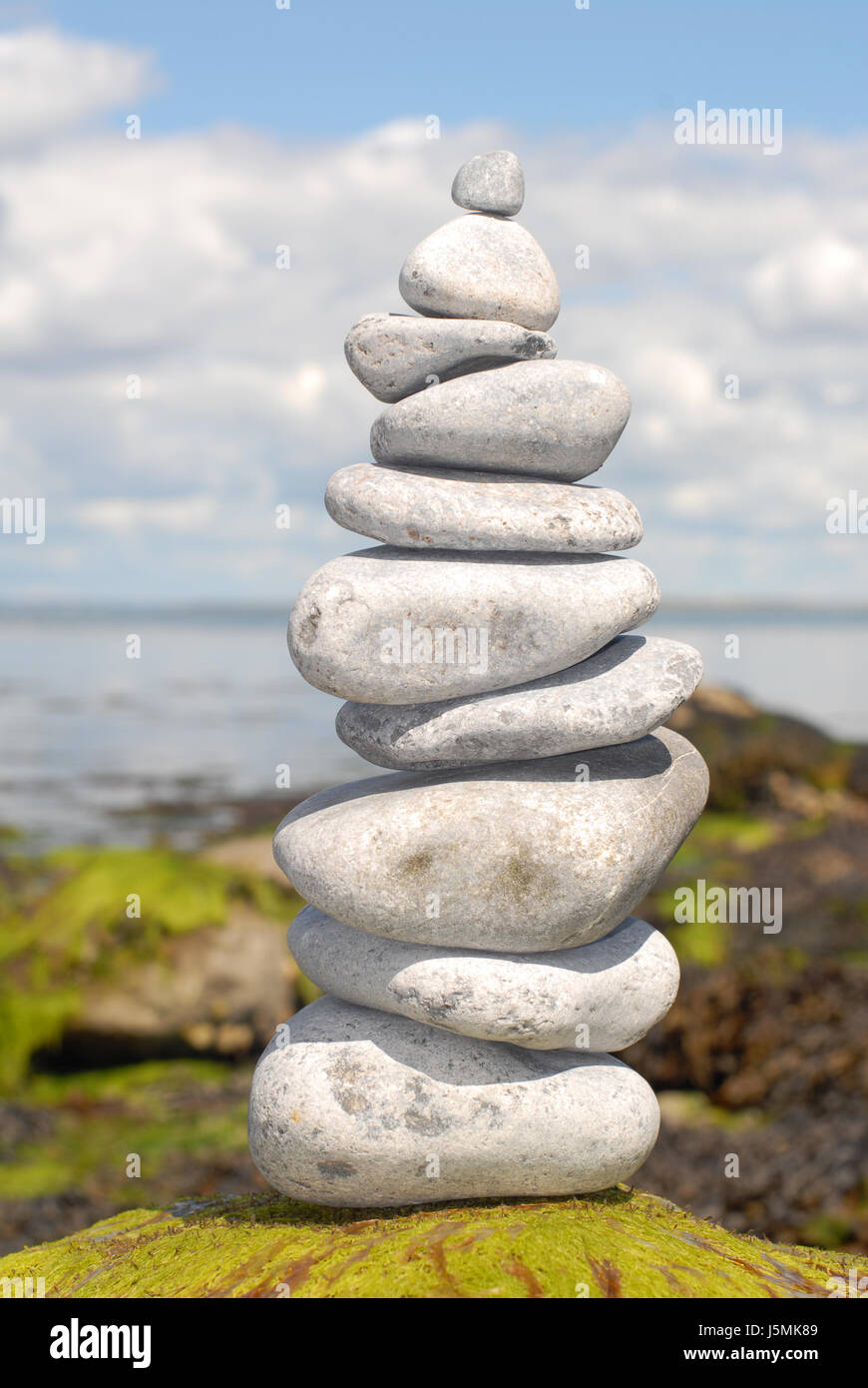 tower stone rock stack statics symbol picture upward ascending steadfast stable Stock Photo