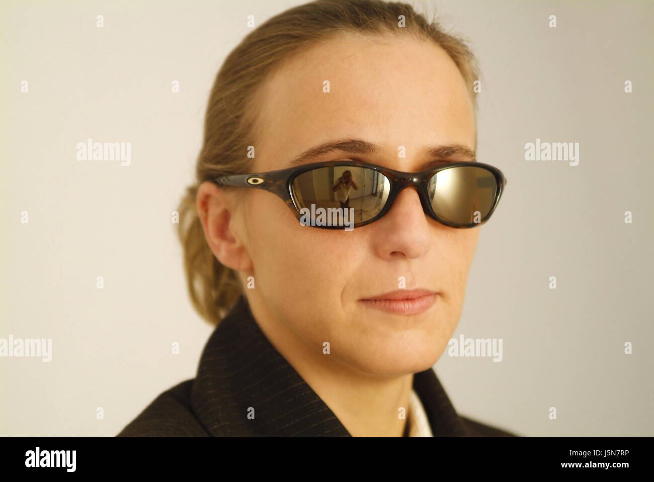 woman mouth reflection photographer severe forehead toilet seat ...