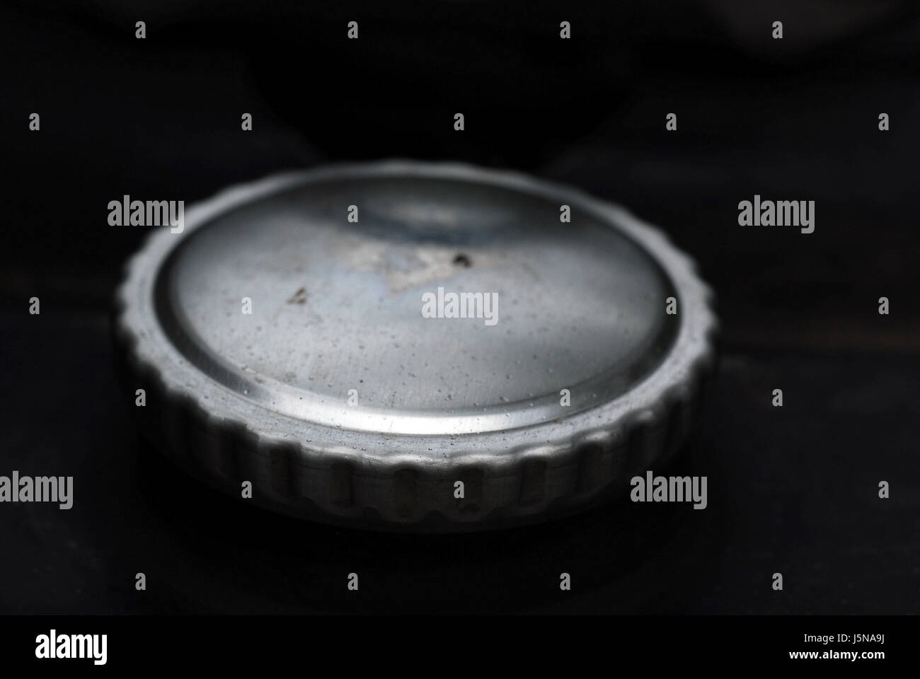 silver closed metal seal shutter lid fasteners tankdeckel tankverschluss Stock Photo