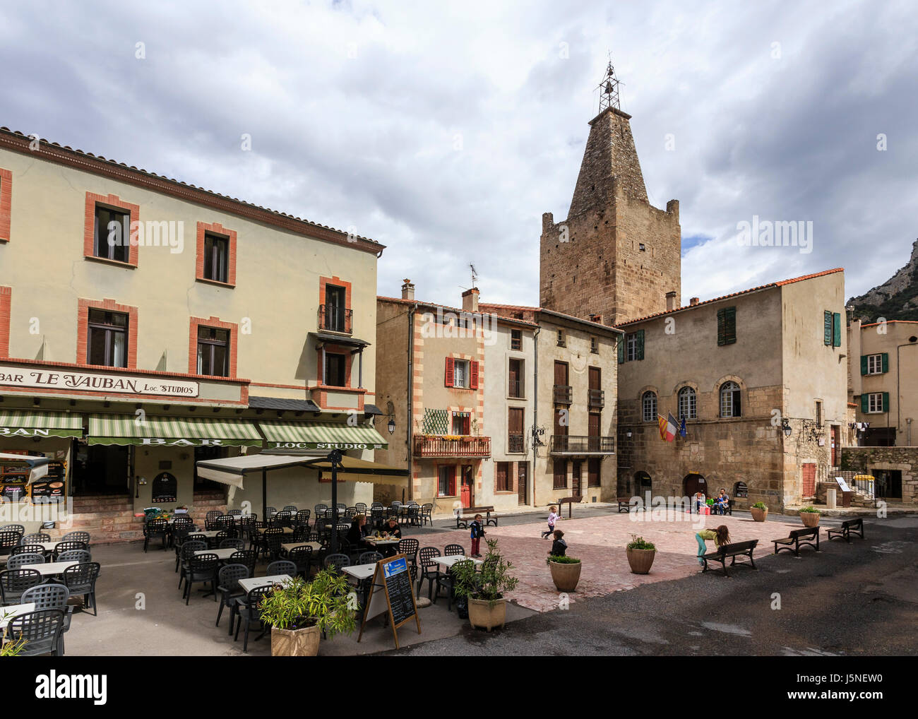 France, Pyrenees Orientales, Villefranche de Conflent, labelled Les Plus Beaux Villages de France, church and Town Hall Square Stock Photo