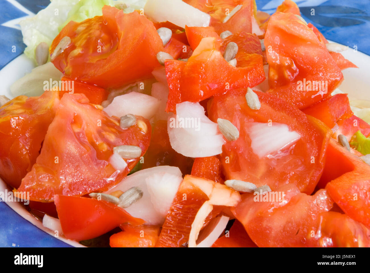 tomato salad with sunflower seeds Stock Photo Alamy