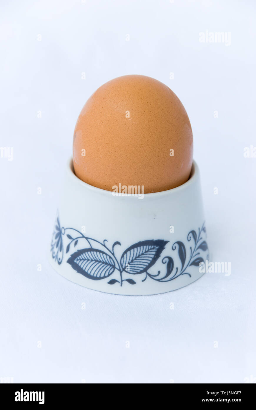 boiled egg in egg holder Stock Photo - Alamy