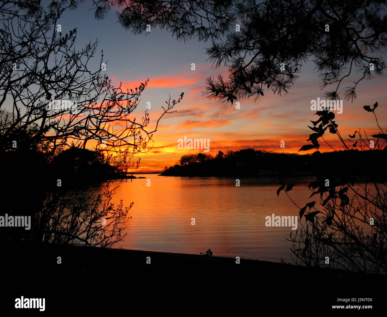 Sunset over Manchester Harbor Stock Photo