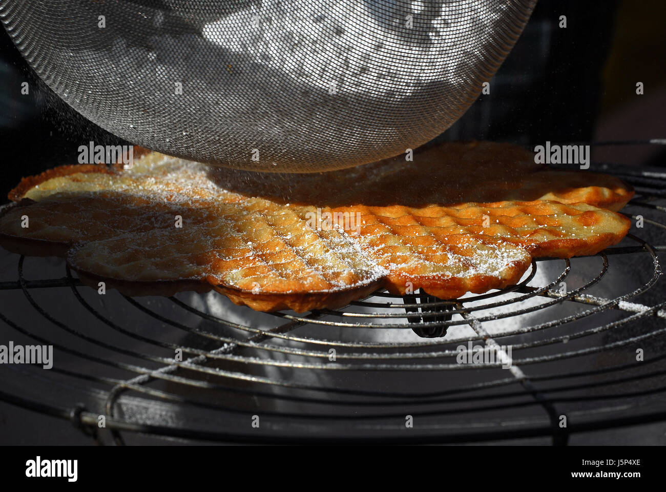 hot iron pastry bake waffle wafers waffles flat dough pancake baked containing Stock Photo