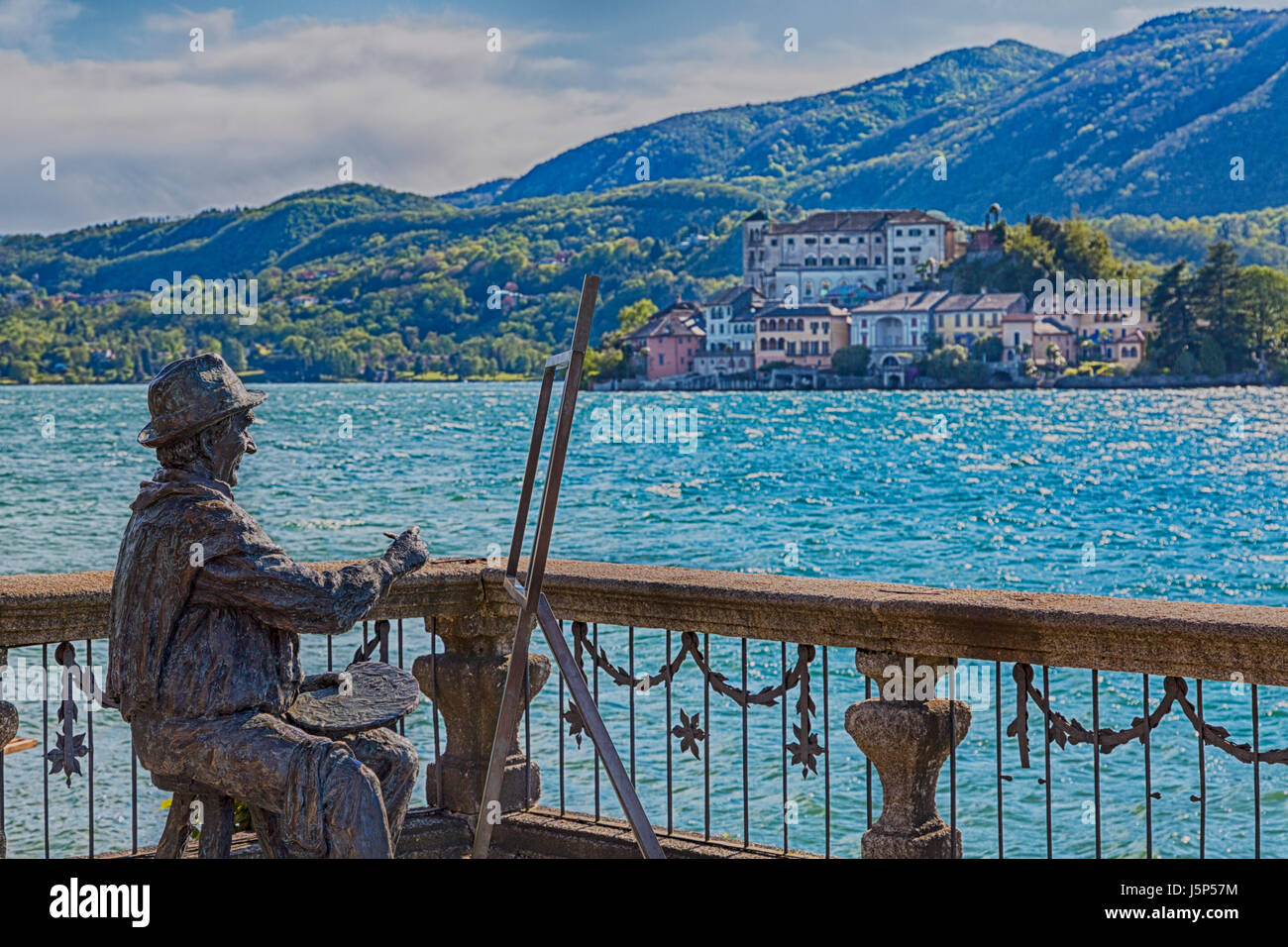statue of artist painting at Orta San Giulio, Lake Orta, Italy in ...