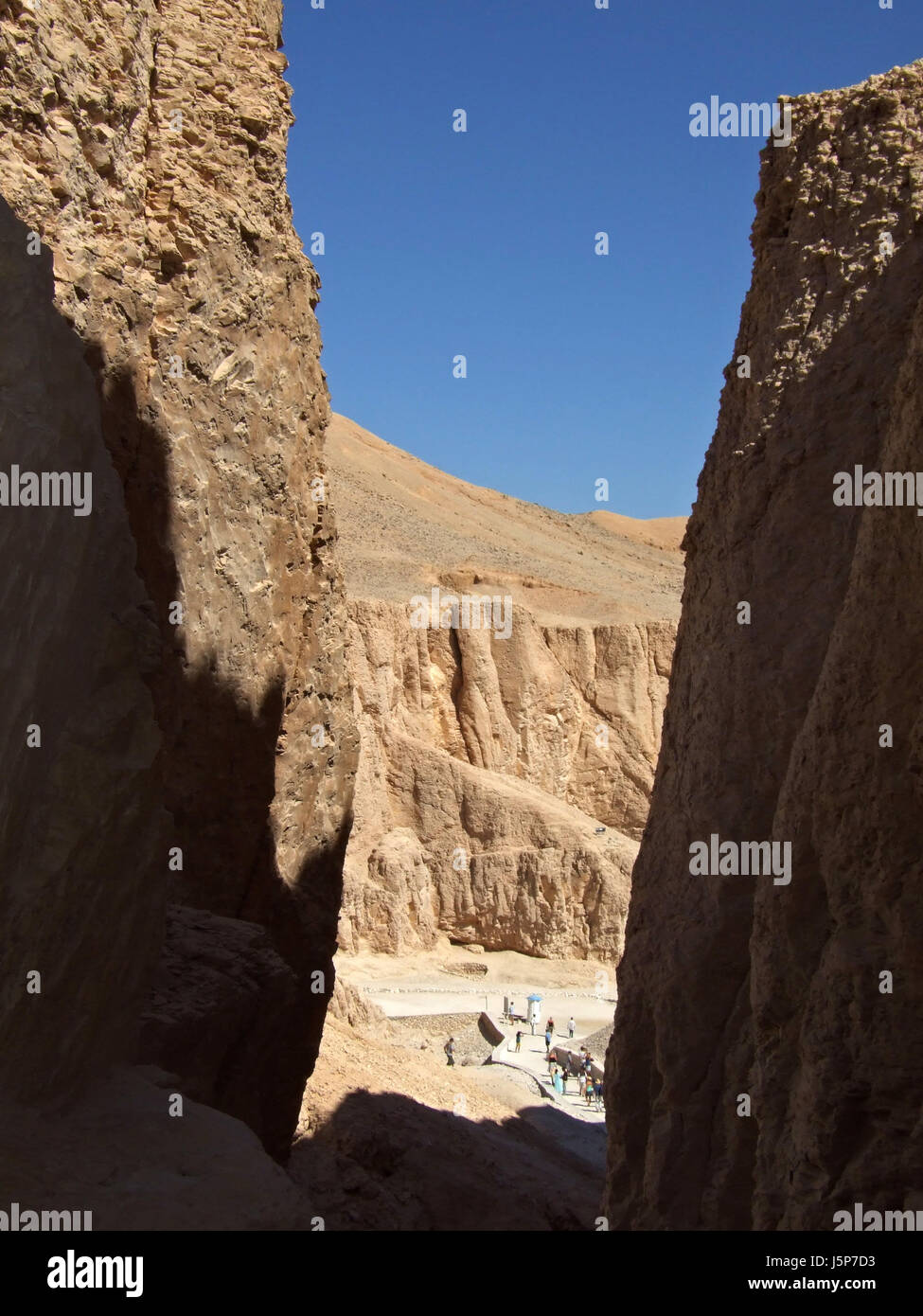 monument statue egypt ravine mountain blue humans human beings people ...