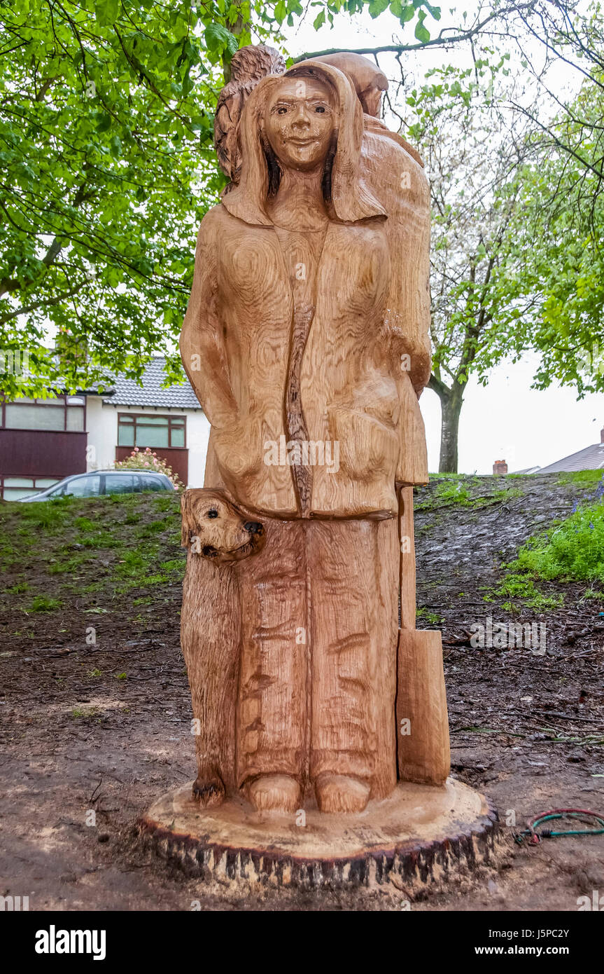 Chainsaw sculptures by Manchester sculptor Andy Burgess. Andy's work at Ten Acre Pits. Tenacre wood Huyton. Stock Photo