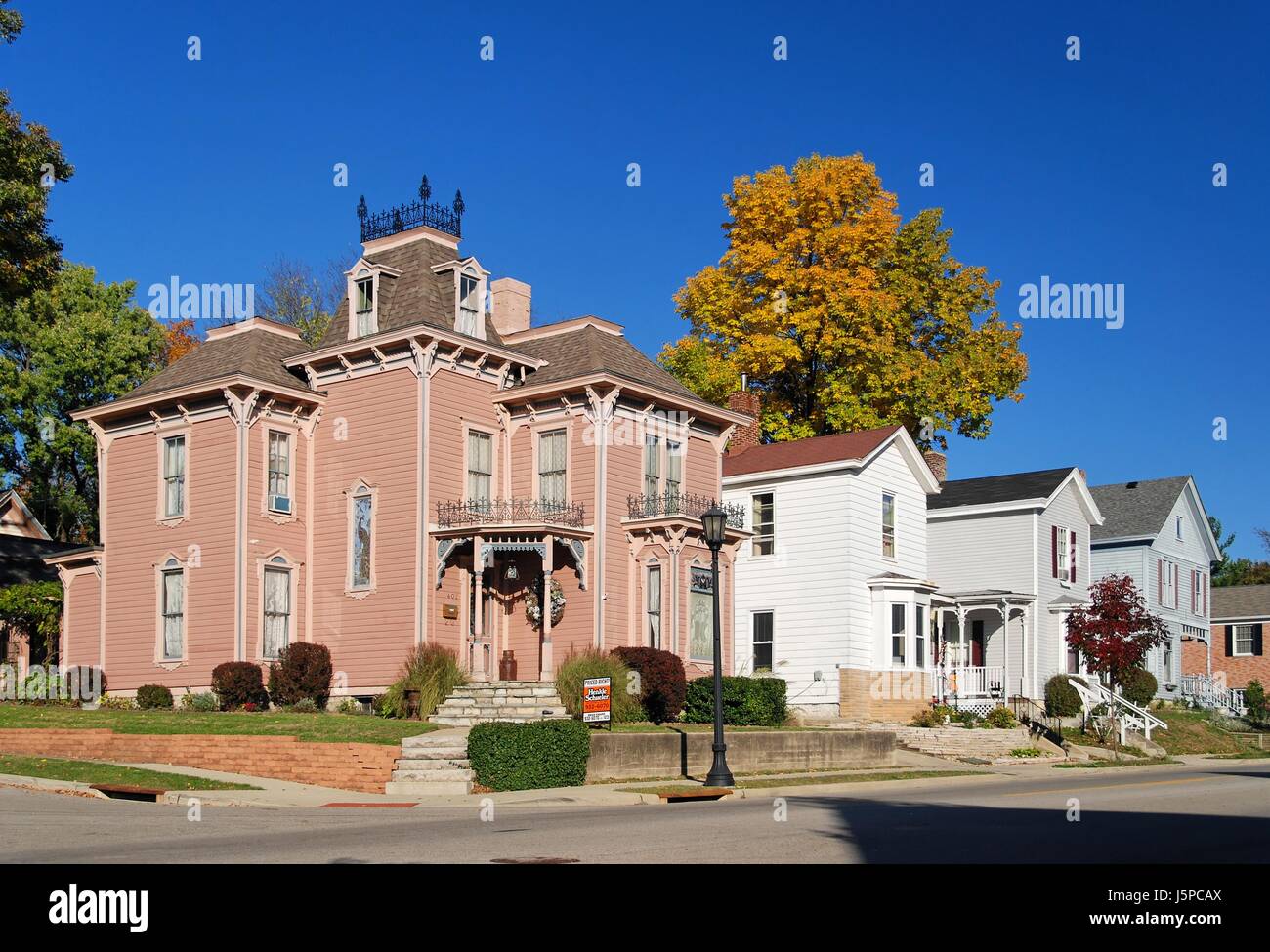blue house building shine shines bright lucent light serene luminous houses Stock Photo