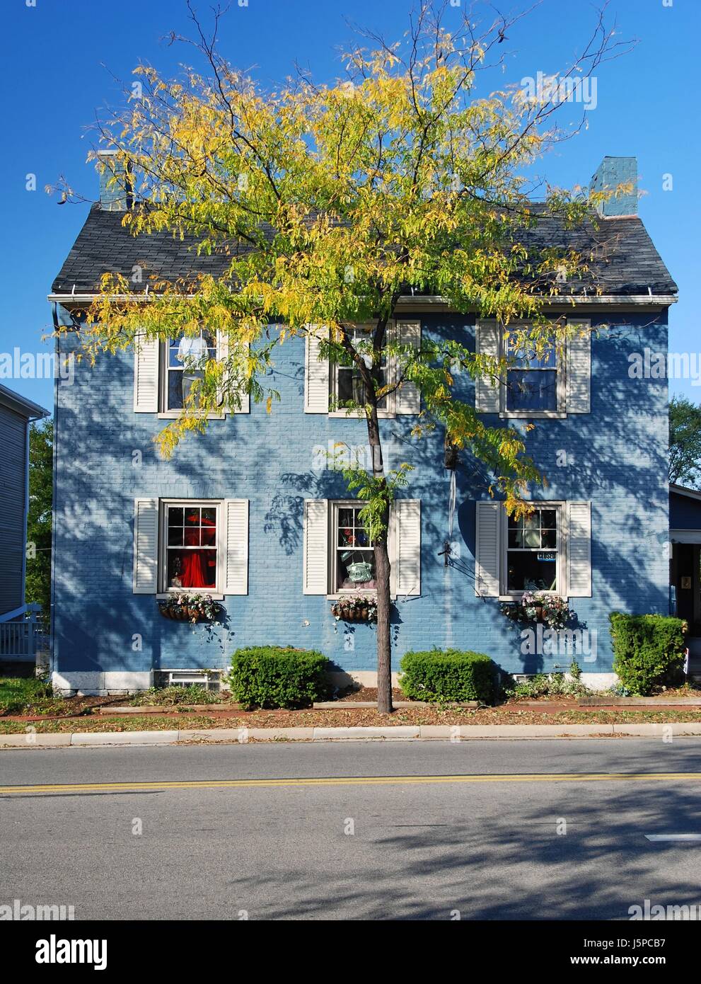 blue house building shine shines bright lucent light serene luminous colour Stock Photo