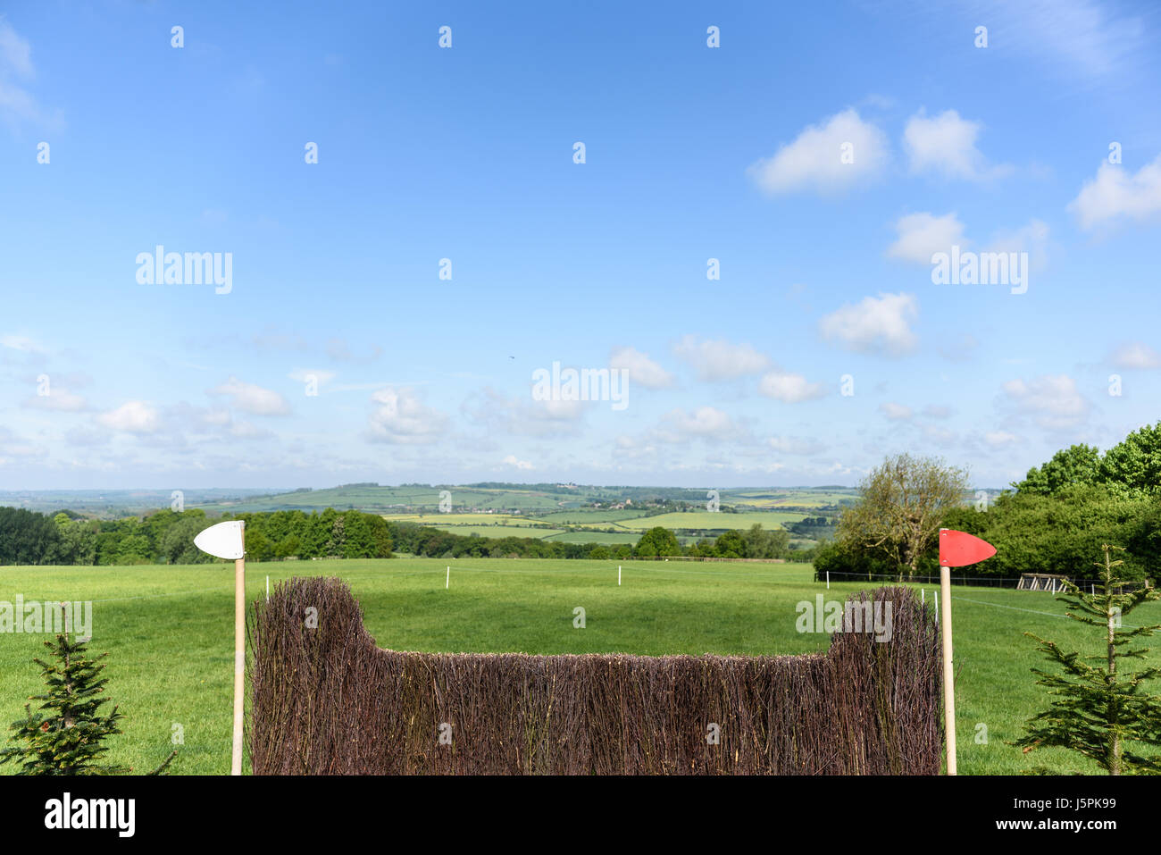 Rockingham Castle, Corby, England. 18th May 2017. A view of obstacles during a sunny and cloudy day on an empty cross country course in the grounds of Rockingham Castle as riders take part in the dressage event. Credit: miscellany/Alamy Live News Stock Photo