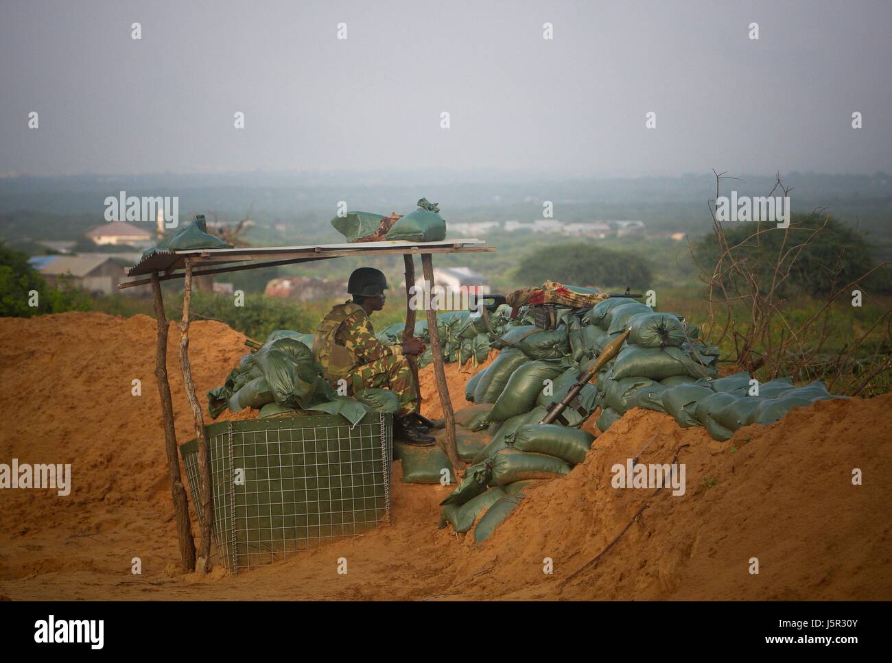African Union Mission in Somalia (AMISOM) Burundian soldiers man the frontline in a territory recently captured from insurgents in the Deynile District November 18, 2011 near Mogadishu, Somalia.    (photo by Stuart Price/ANISOM via Planetpix) Stock Photo