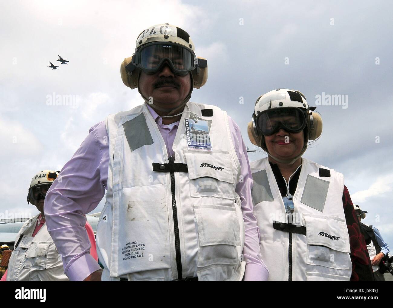 Palauan President Johnson Toribiong and wife Valeria Toribiong watch aircraft take off from the flight deck of the USN Nimitz-class aircraft carrier USS George Washington during a visit June 21, 2009 in the Pacific Ocean.    (photo by MCSS Rachel N. Clayton /US Navy  via Planetpix) Stock Photo