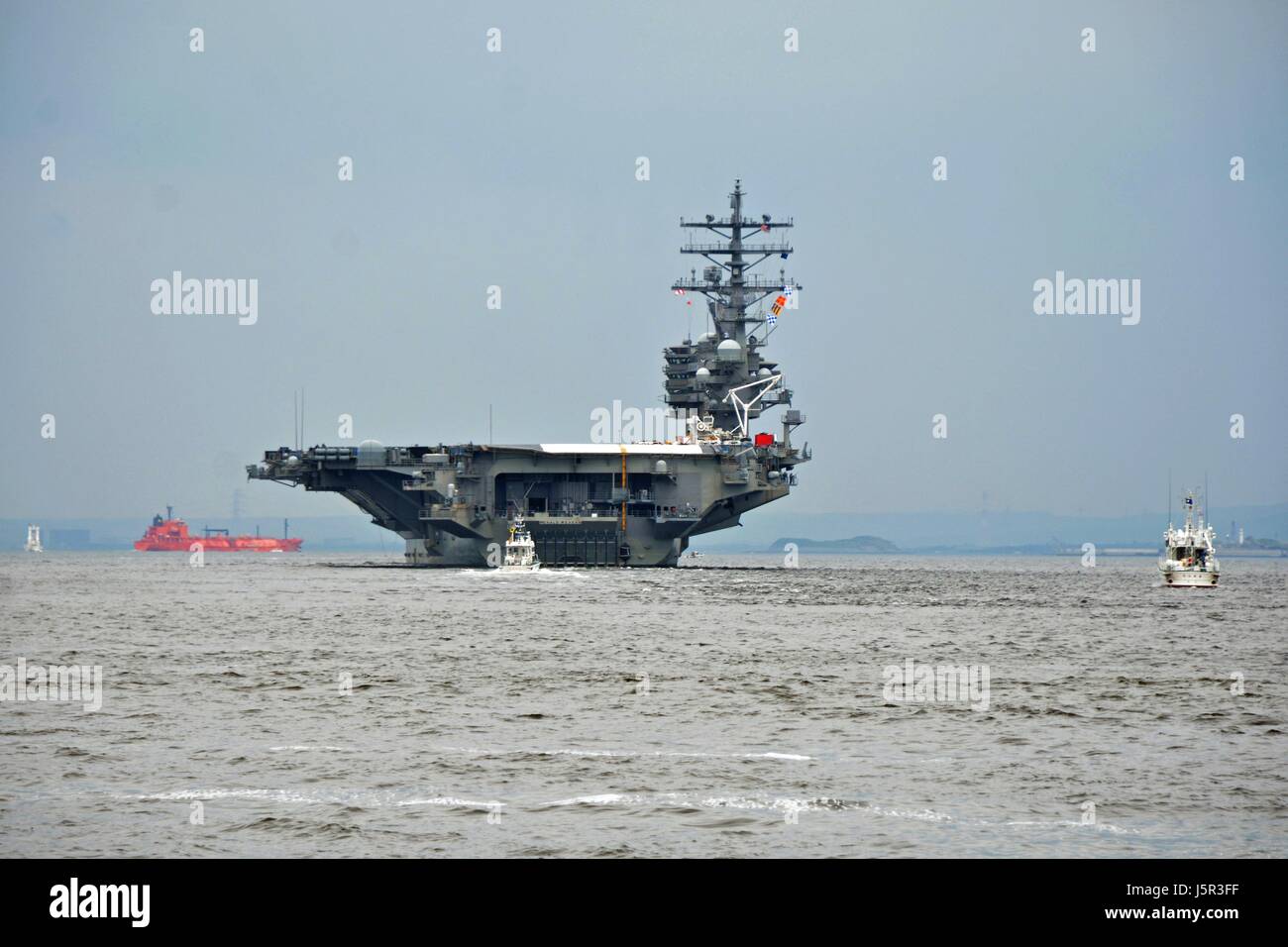 The USN Nimitz-class aircraft carrier USS Ronald Reagan departs Fleet Activities Yokosuka May 16, 2017 in Yokosuka, Japan.    (photo by Peter Burghart /US Navy  via Planetpix) Stock Photo