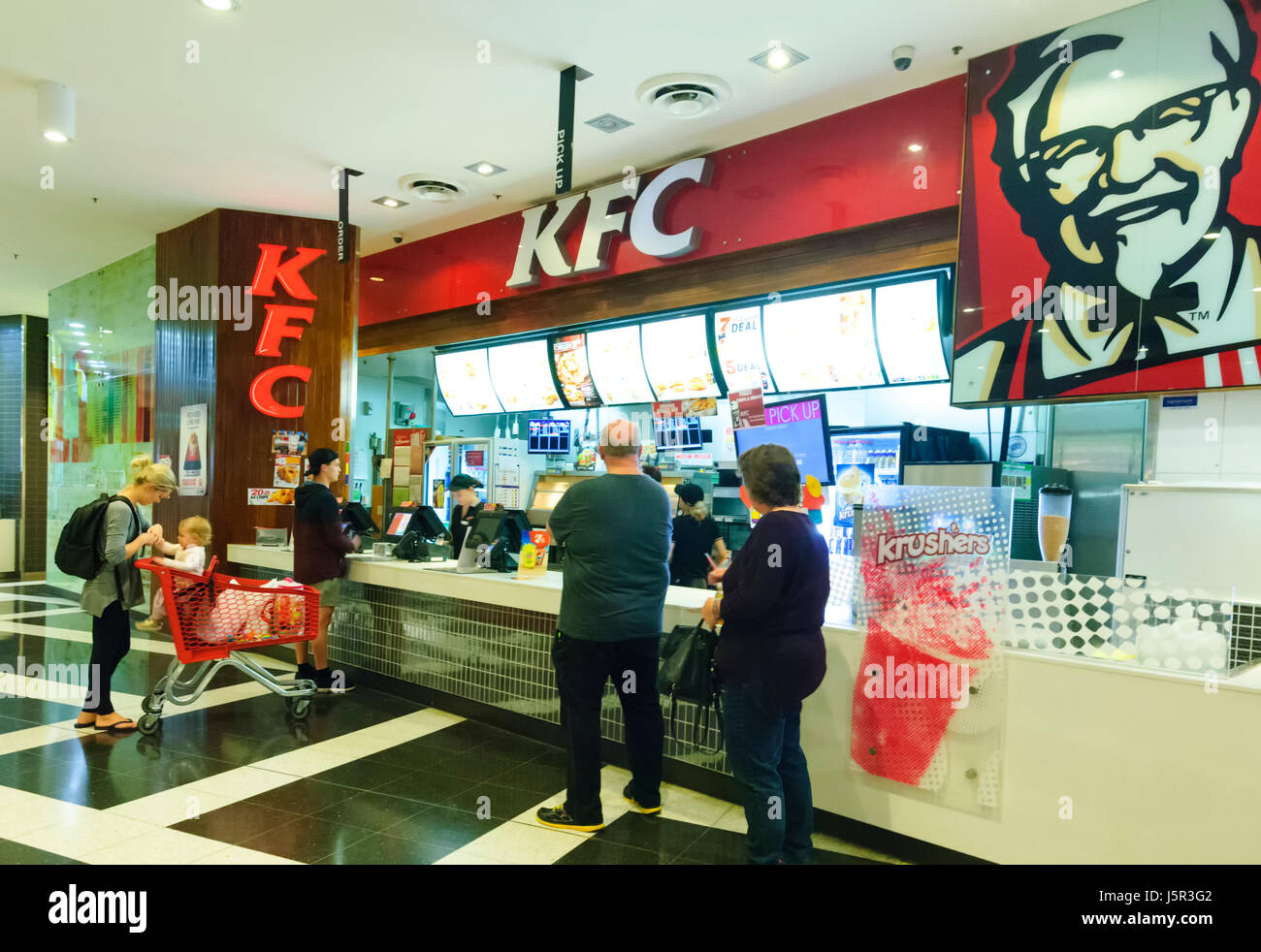 People queueing up at a KFC Outlet, New South Wales, NSW, Australia Stock Photo
