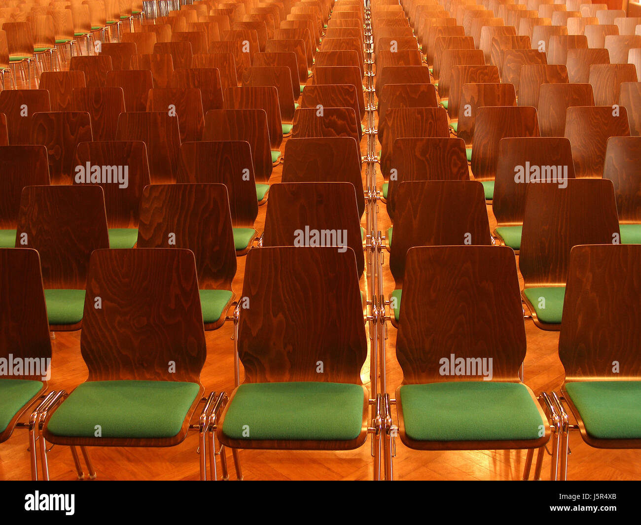 legs room row chairs hall square seat parquet arm seating seats demonstration Stock Photo