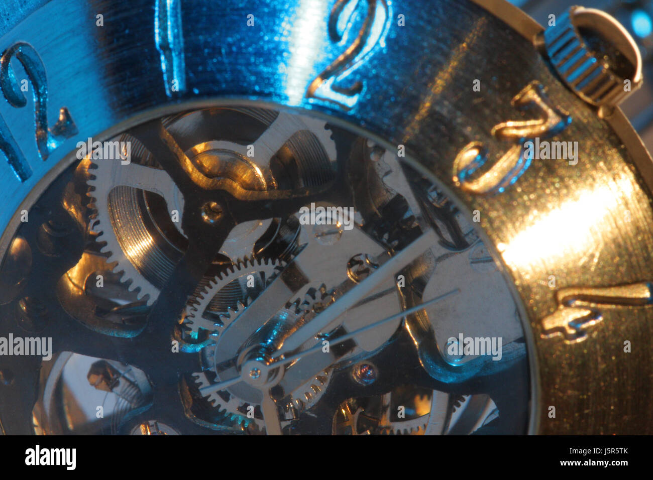 blue engineering lighted clock pointer time metal clockwork wheel