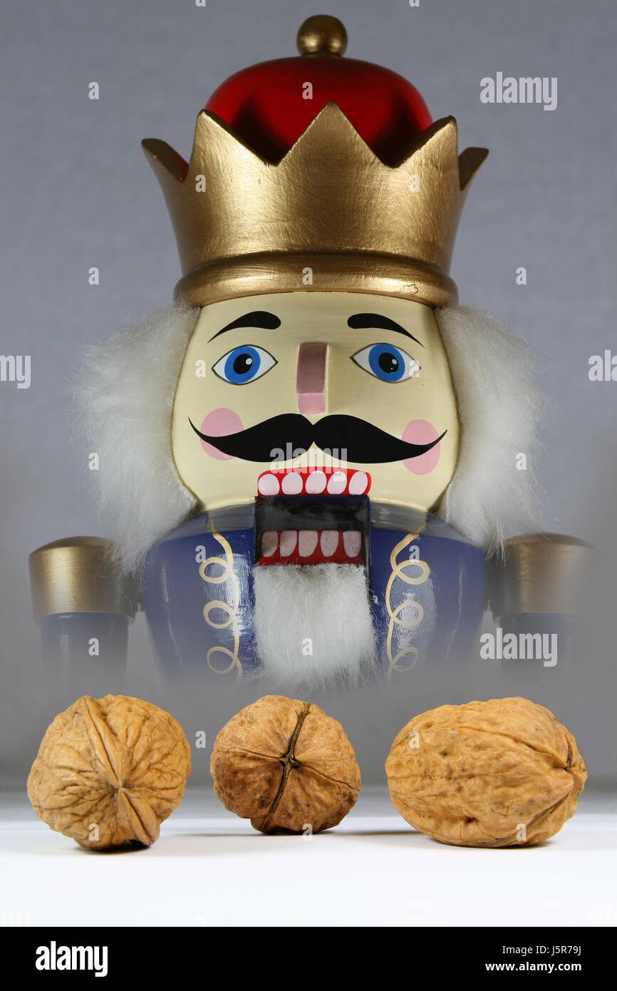 teeth frowningly menacing crown nut crack walnut nutcracker threaten food Stock Photo