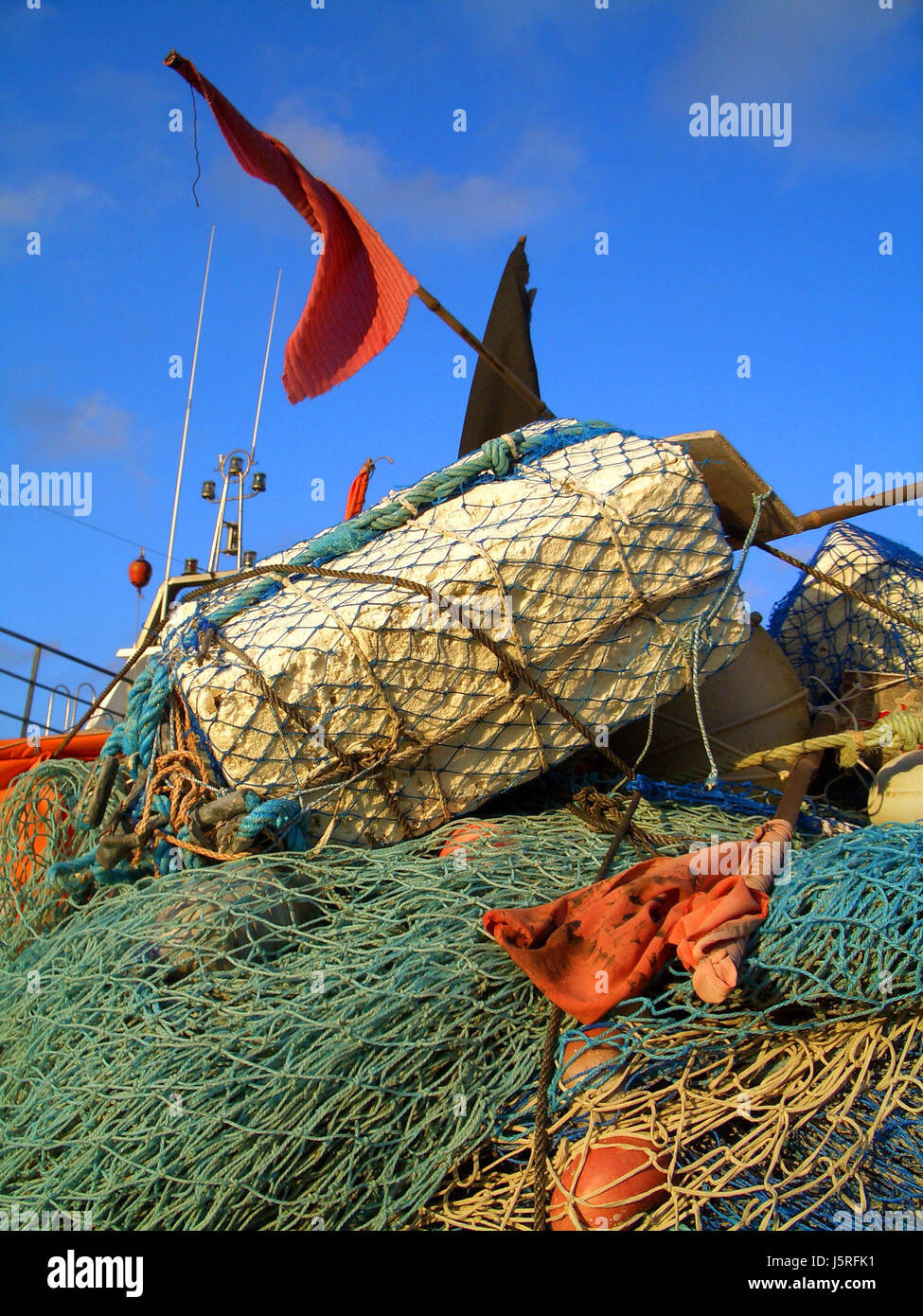 blue green chaos confusion mess net dew fishing fishery nets boost firmament Stock Photo