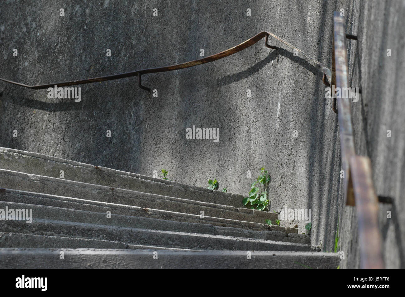 stairs lines concrete wall steel railing dreary raise guide grey gray ...