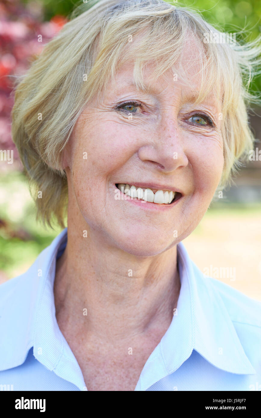Outdoor Head And Shoulders Portrait Of Senior Woman Stock Photo - Alamy
