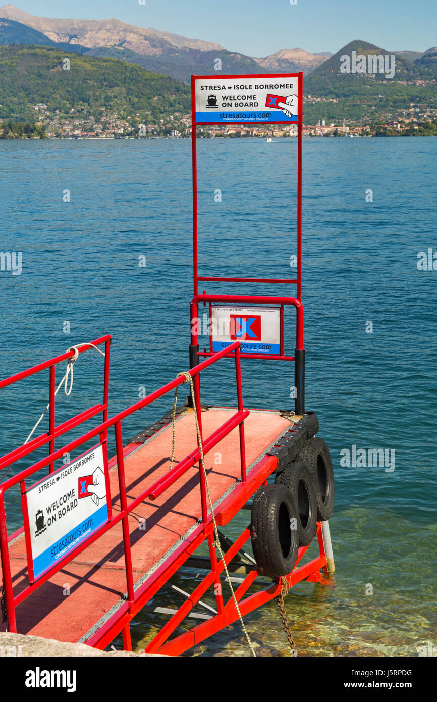 jetty for stresatours boat trips between Stresa and Isole Borromee at  Stresa, Lake Maggiore, Italy in April Stock Photo