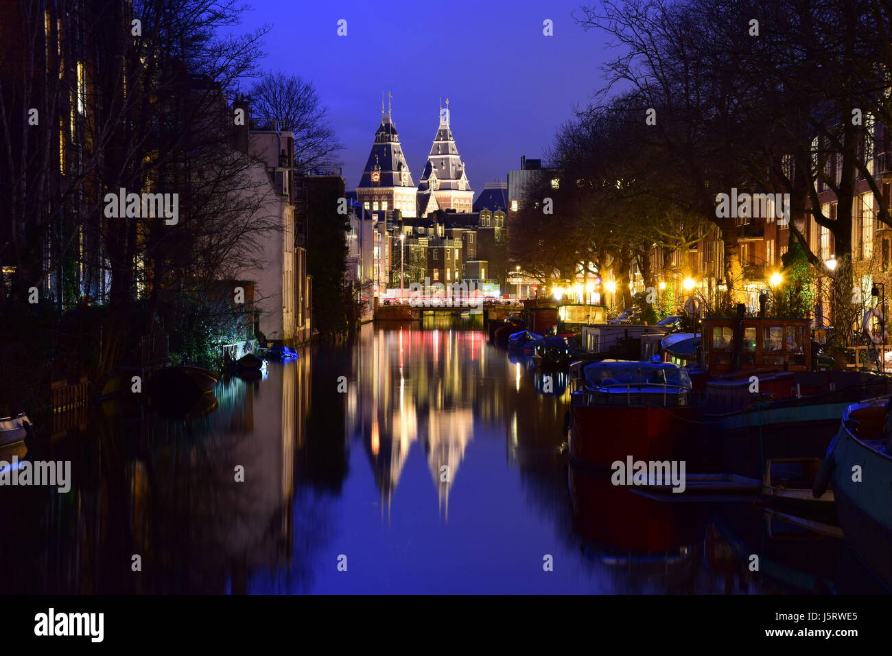 Night time on the canals of Amsterdam, Netherlands Stock Photo