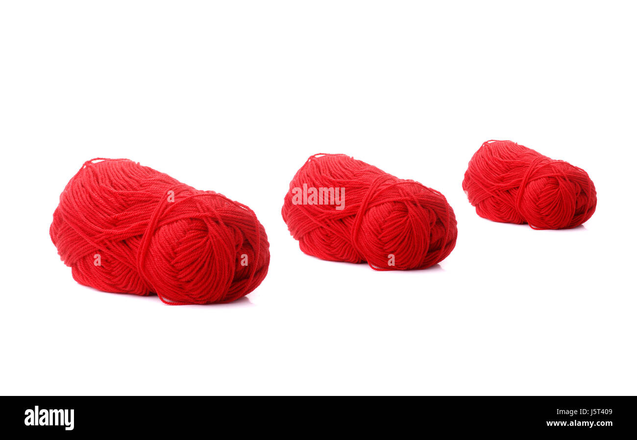 three red balls of wool Stock Photo