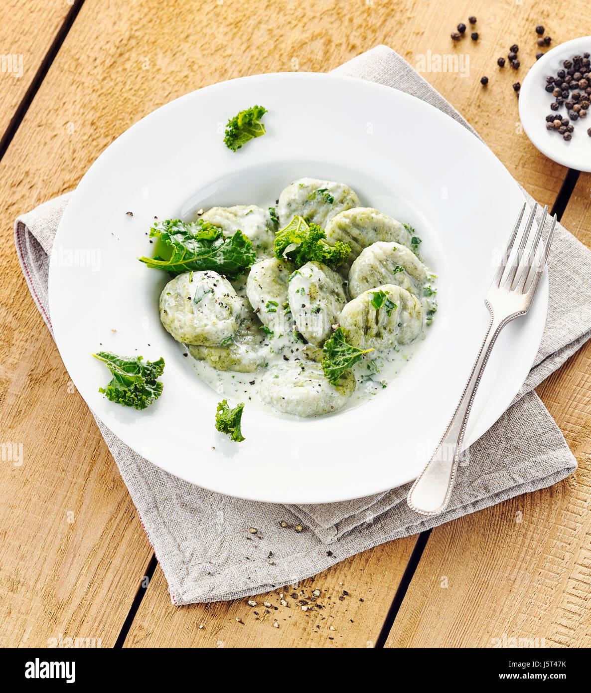 Gnocchi with kale in blue cheese sauce Stock Photo Alamy