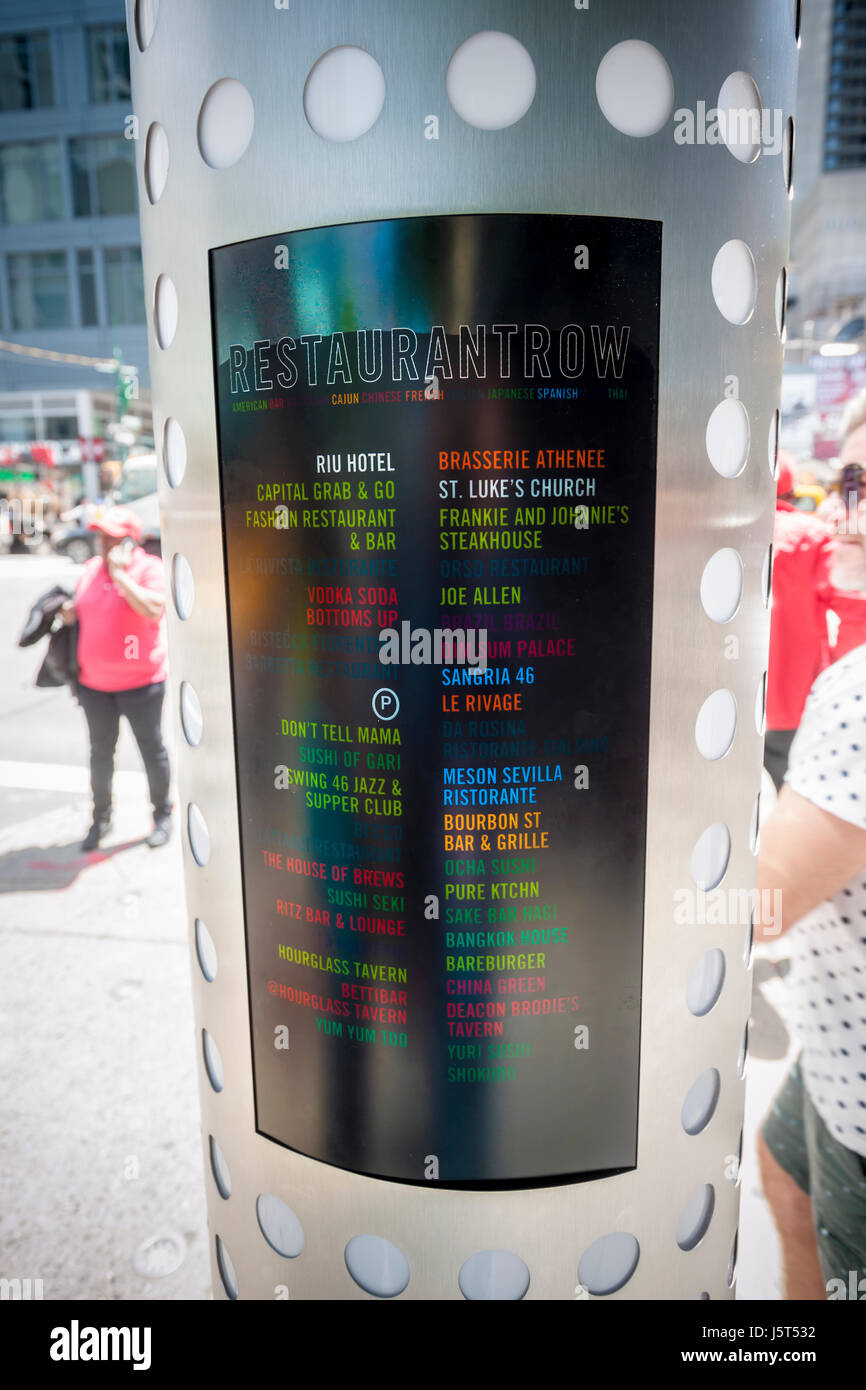 One of the new wayfinding kiosks that stand at either end of Restaurant Row in New York, West 46th street between 8th and 9th Avenues, on Tuesday May 16, 2017. At least four years in the making the illuminated kiosks show the names of the many eateries that populate the street. The unveiling is just in time for the Taste of Times Square event taking place on the street on June 5. (© Richard B. Levine) Stock Photo