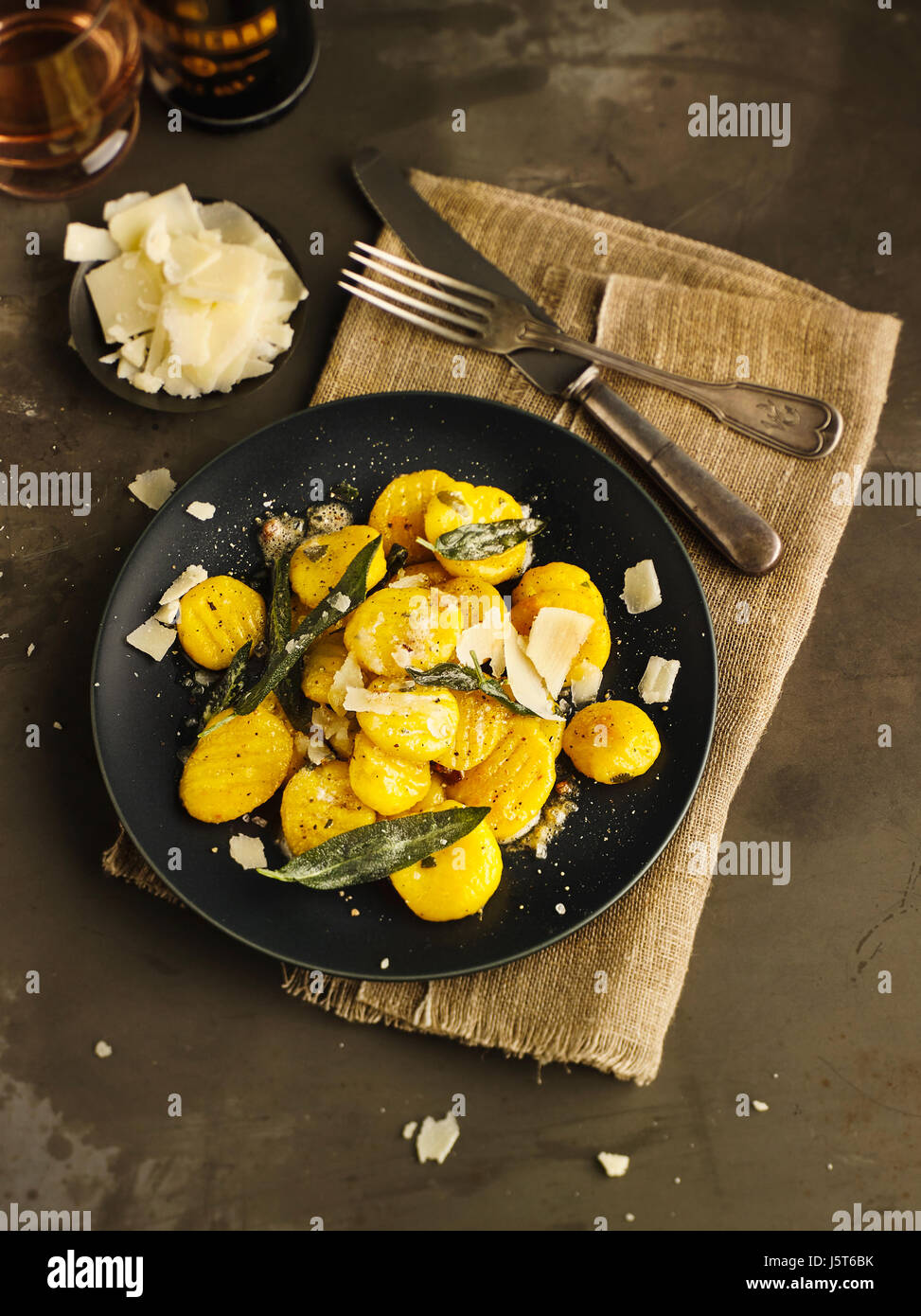 Potato gnocchi with pumpkin in sage butter Stock Photo