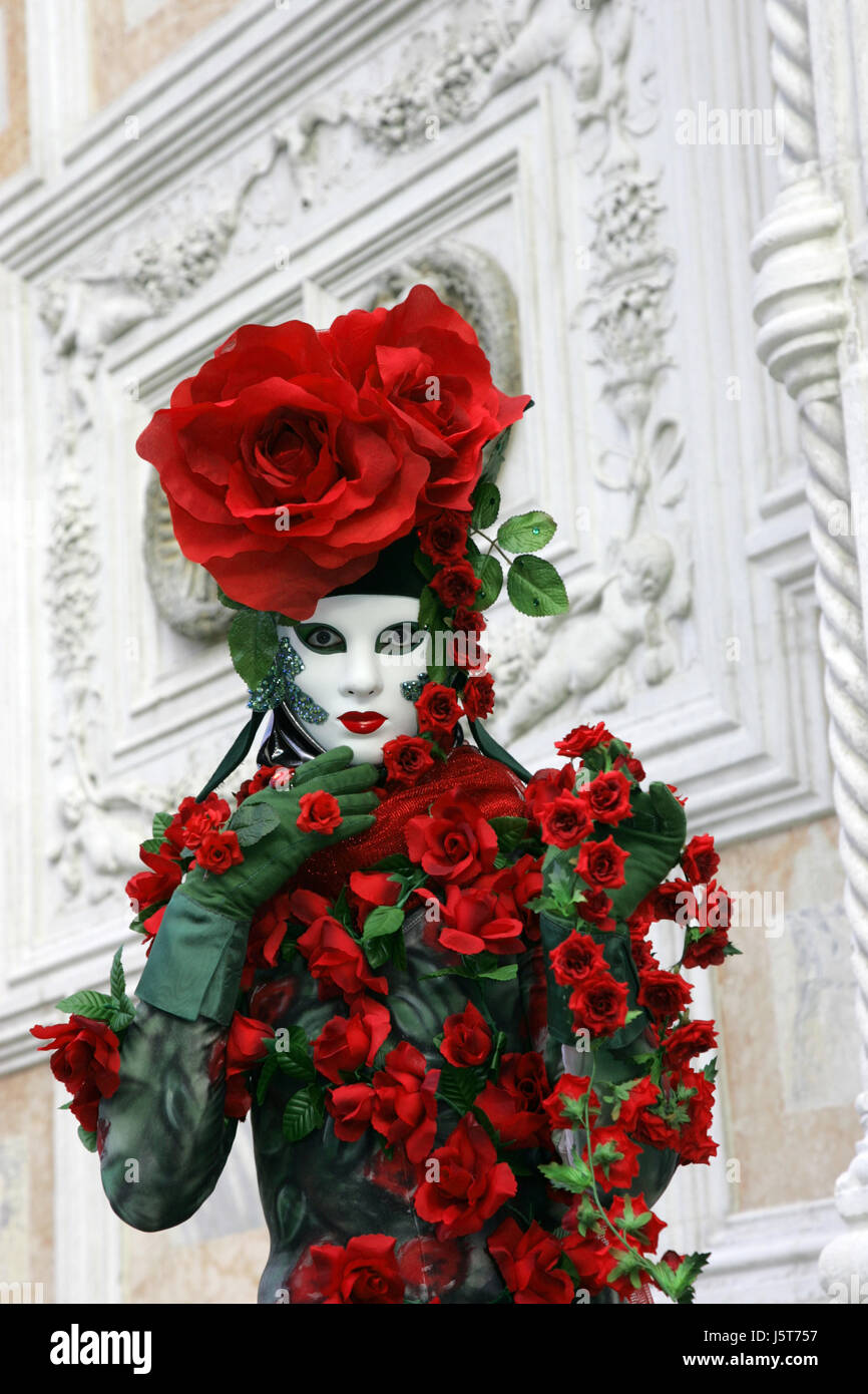 venice roses carnival revetment mask woman culture tourism cirrus coloured Stock Photo
