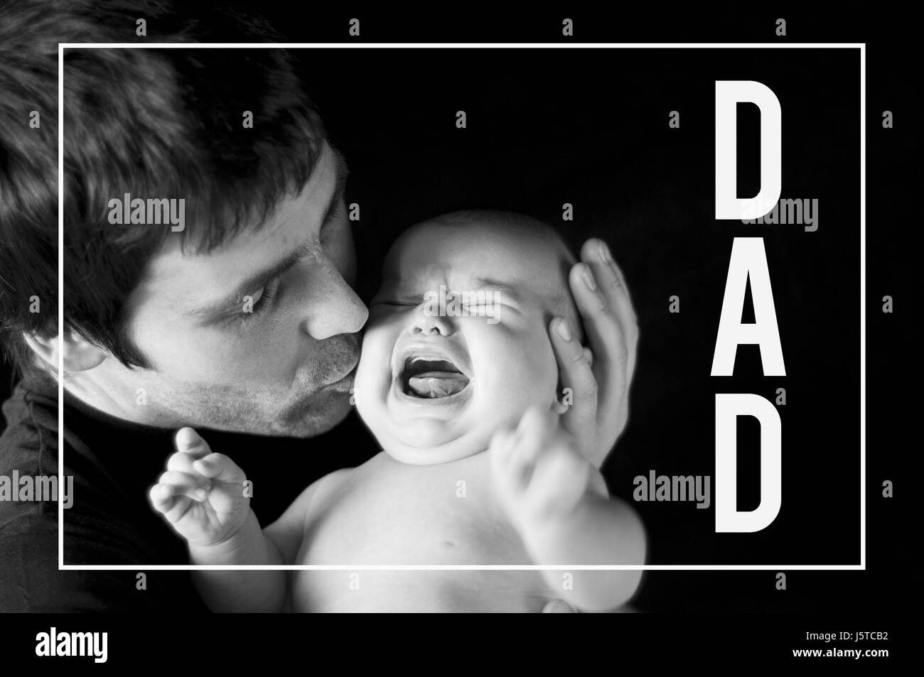 Young father holding his newborn baby. Fathers day. Stock Photo