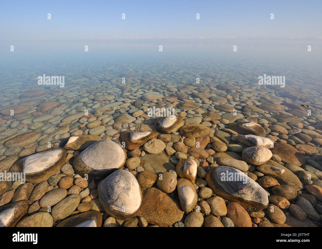 Calm water in Issyk-Kul lake Stock Photo