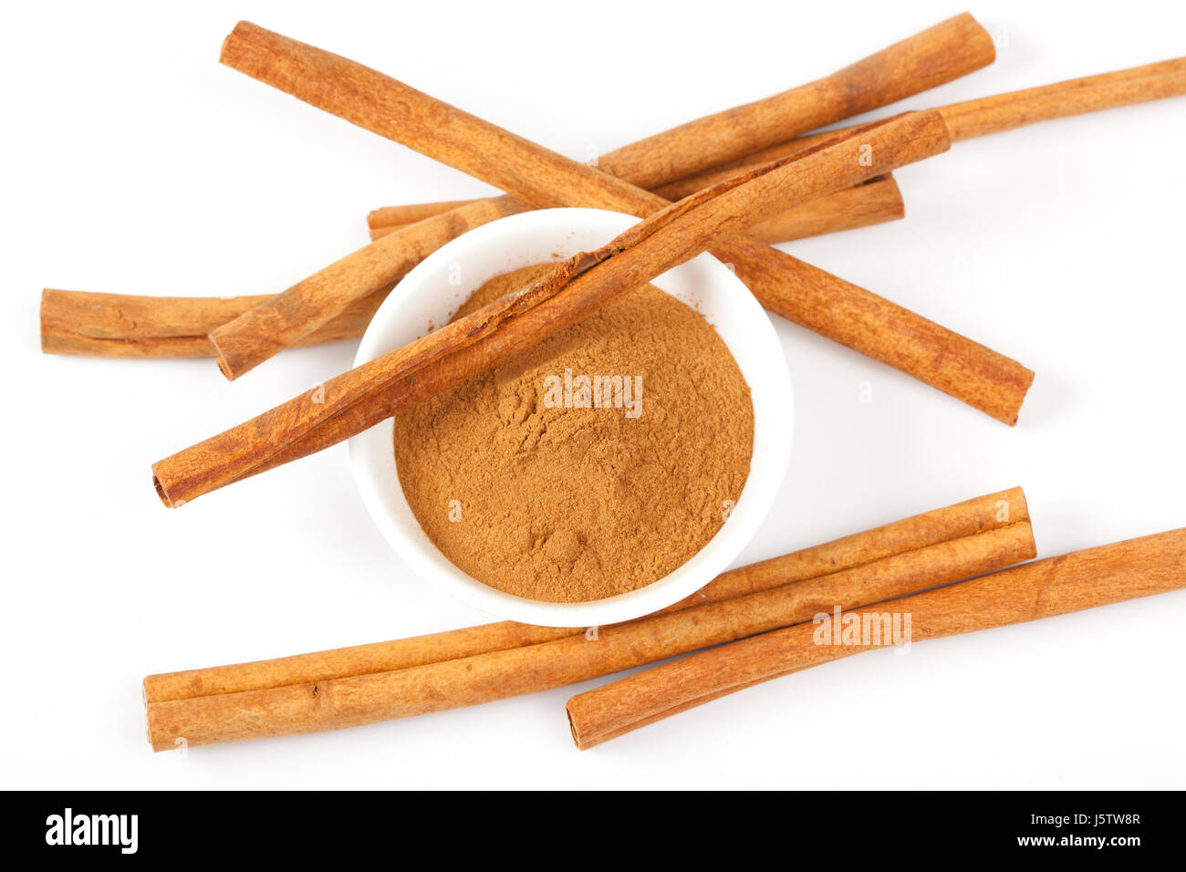 Cinnamon sticks or quills and ground cinnamon Stock Photo Alamy
