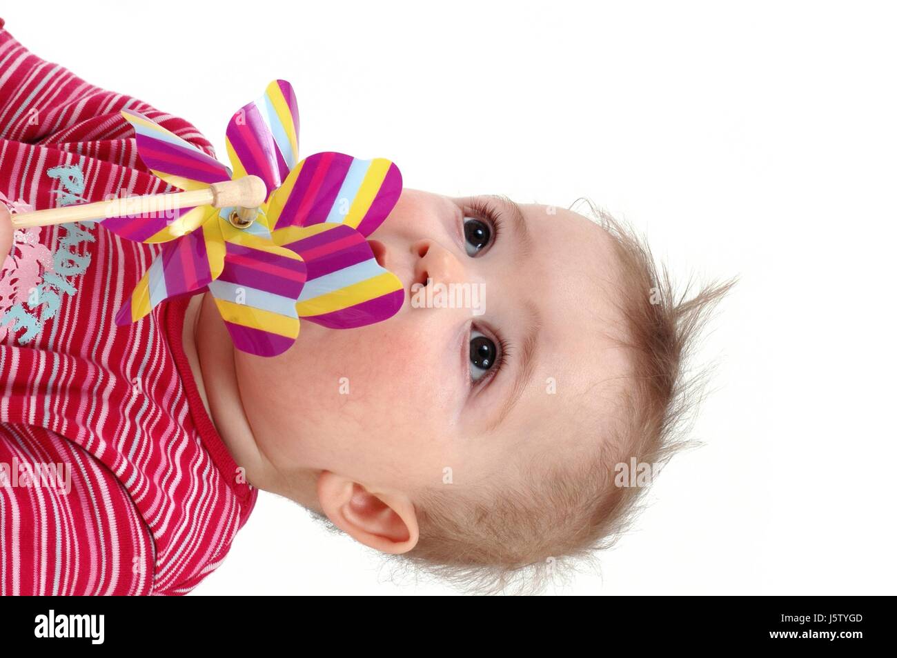 baby with windmill Stock Photo Alamy