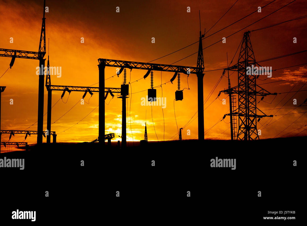Beautiful sunset over an Electrical substation. Stock Photo