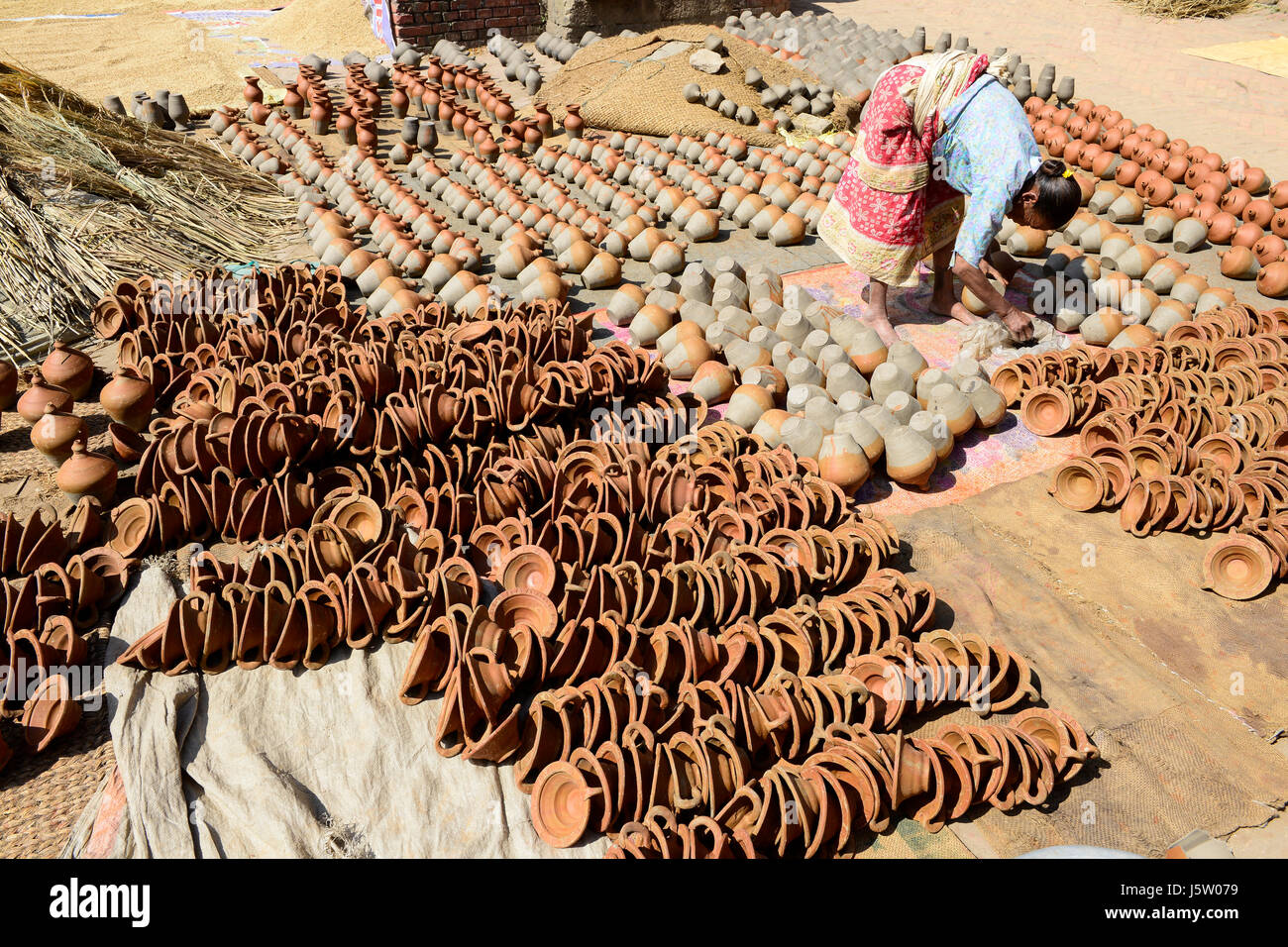 NEPAL Bhaktapur, old town, pottery clay cups laying for
