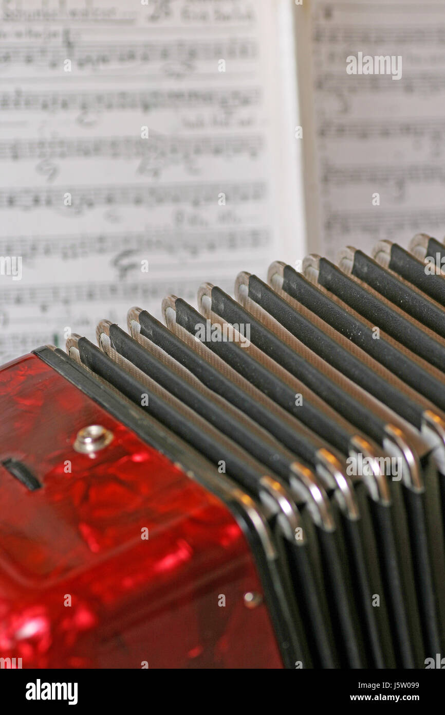 music musical instrument accordion notes harmonica sheet of music make music Stock Photo