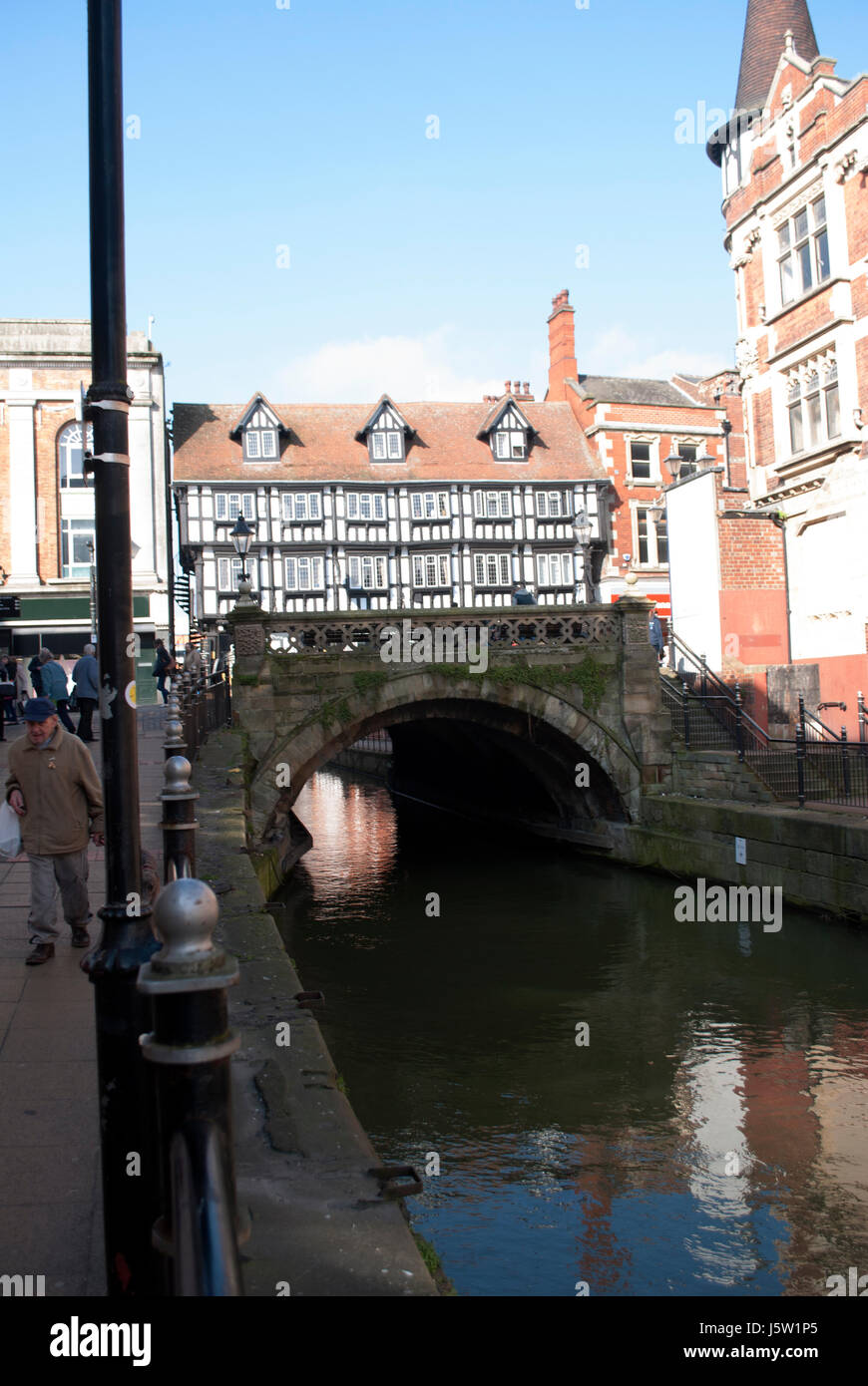 High Bridge over the River Witham in Lincoln with Stokes in the background Stock Photo
