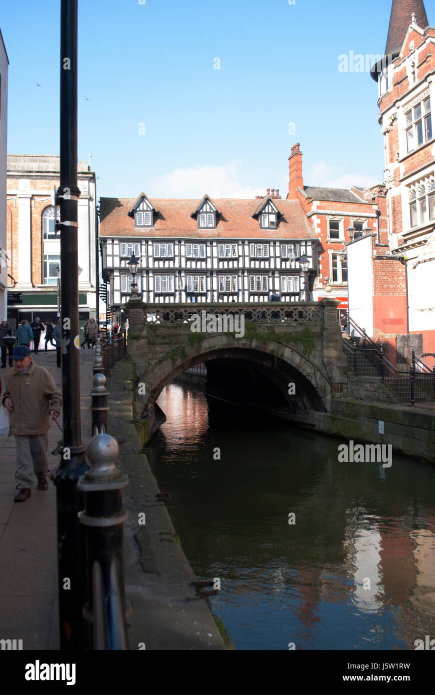 High Bridge over the River Witham in Lincoln with Stokes in the background Stock Photo