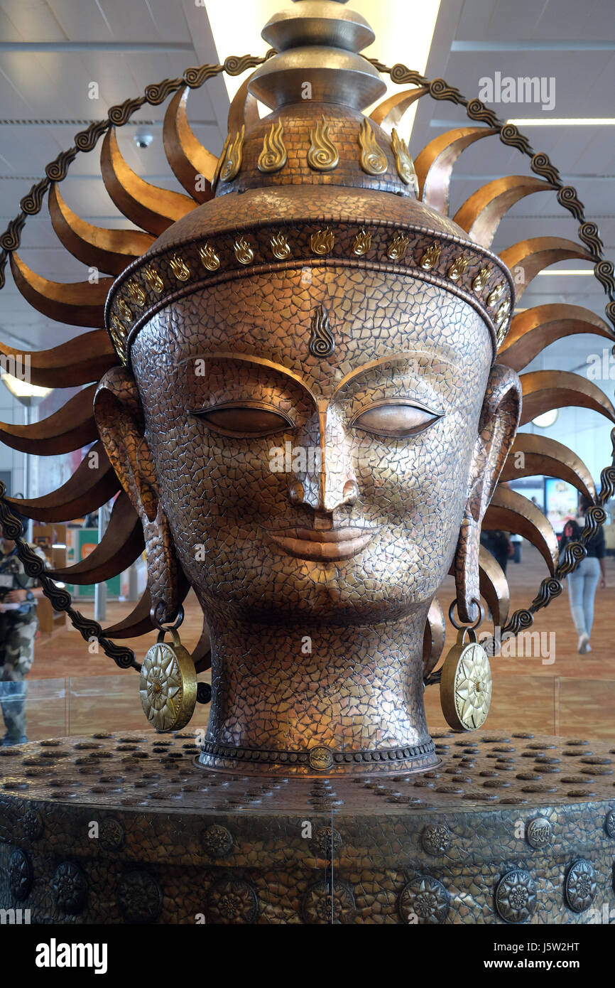 Surya, the resplendent one by Satish Gupta, the big golden statue in international Airport of Delhi on February 19, 2016. Stock Photo